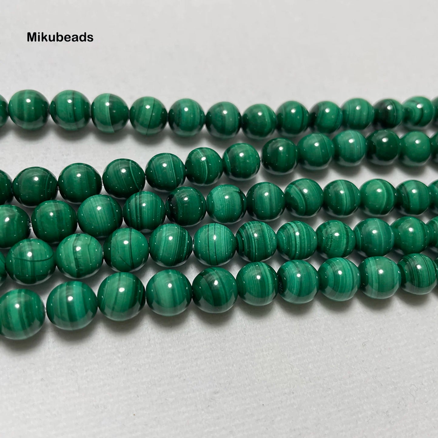 Venta al por mayor de cuentas sueltas redondas lisas de malaquita A+ naturales de 7,5 a 8 mm para hacer joyas, collares de piedra DIY, hebra de 15 pulgadas