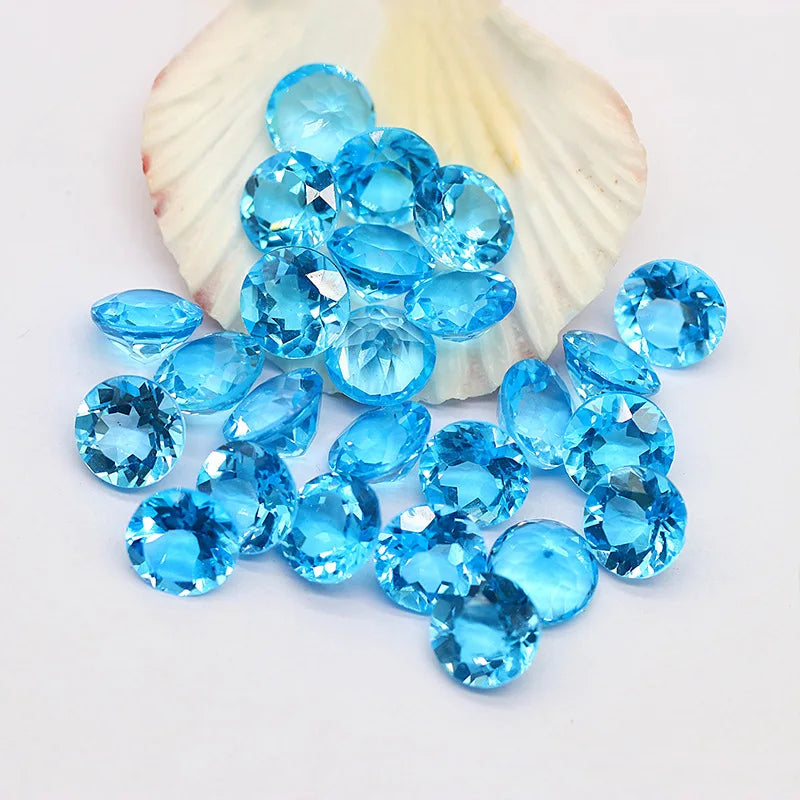 Venta al por mayor de fábrica de piedras preciosas de topacio azul cielo 100 % naturales y reales, gemas sueltas, material de bricolaje para joyería