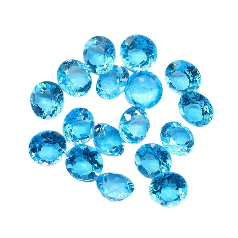 Venta al por mayor de fábrica de piedras preciosas de topacio azul cielo 100 % naturales y reales, gemas sueltas, material de bricolaje para joyería